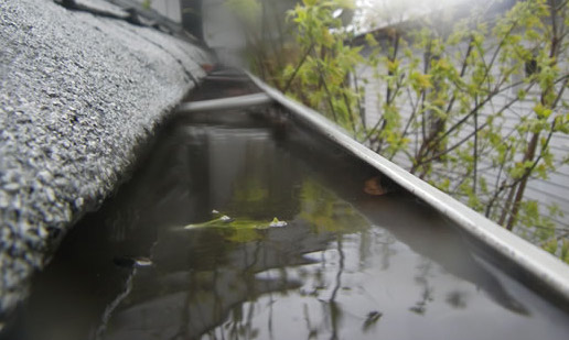 Gutter Pitch Adjustment Repair From Water Pooling